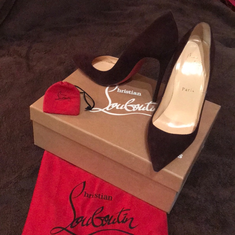 Suede Louboutin shoes in a deep plum color